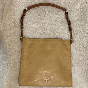 Prada shoulder bag in nude and brown leather.